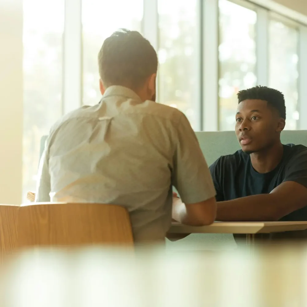 Counselor and client in a one-on-one conversation at Ahava Wellness Center